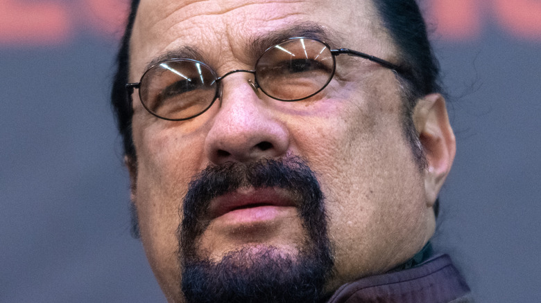 Steven Seagal reacts at an event