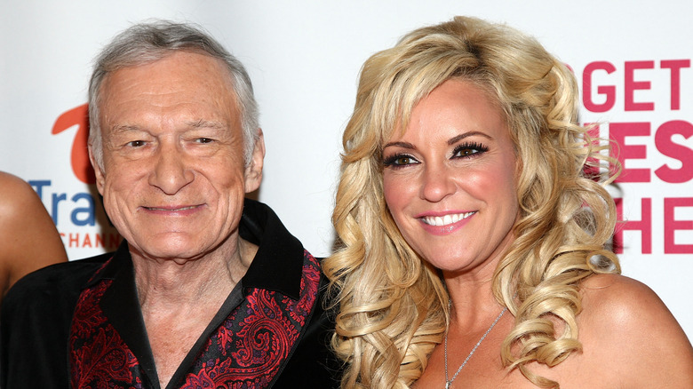 Bridget Marquardt and Hugh Hefner pose 