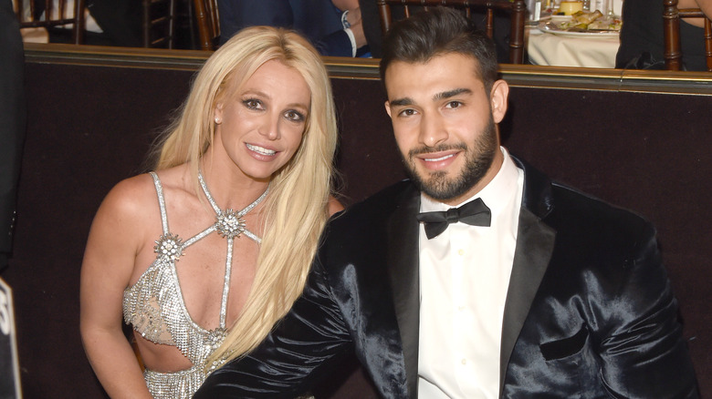 Britney Spears and Sam Asghari smiling