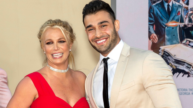 Britney Spears and Sam Asghari smiling