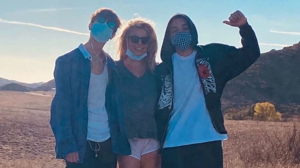 Britney Spears and teen sons posing