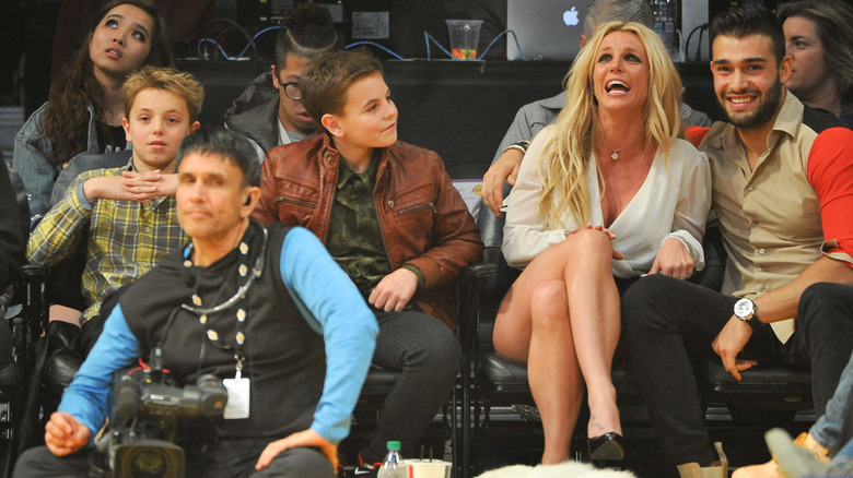 Britney Spears attends a game with sons and Sam Asghari