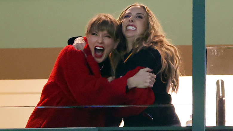 Taylor Swift and Brittany Mahomes embracing