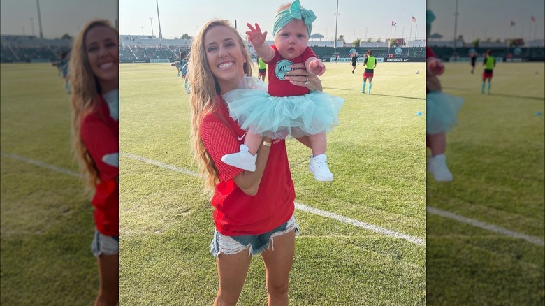 Brittany Mahomes holding daughter