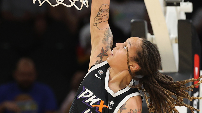 Brittney Griner dunking a basketball