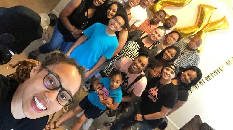 Brittney Griner taking a selfie with family and friends