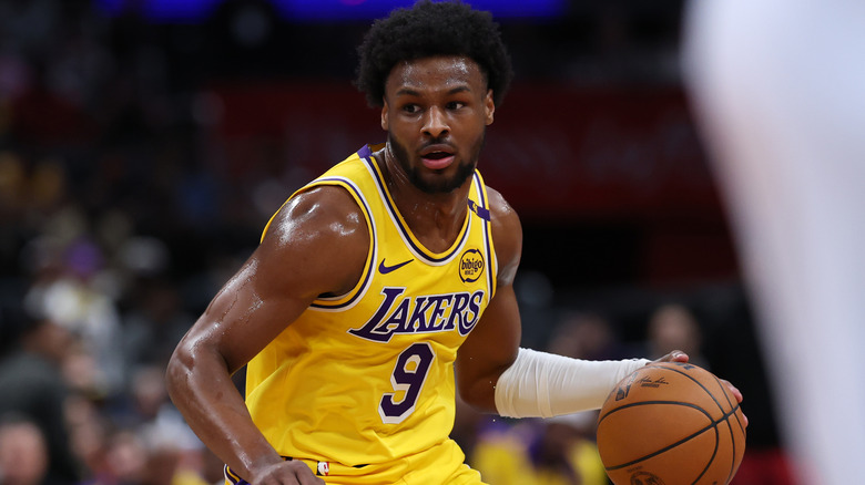 Bronny James Lakers on the court wearing his Lakers basketball uniform