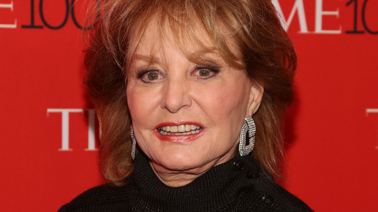 Barbara Walters posing for photo