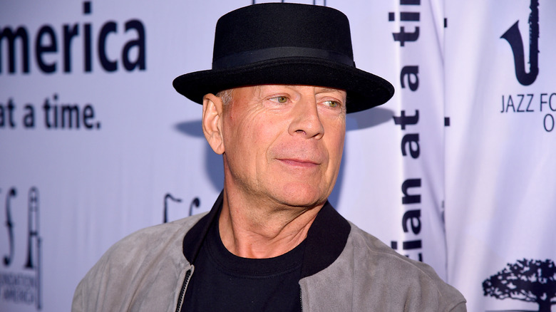 Bruce Willis wearing a hat