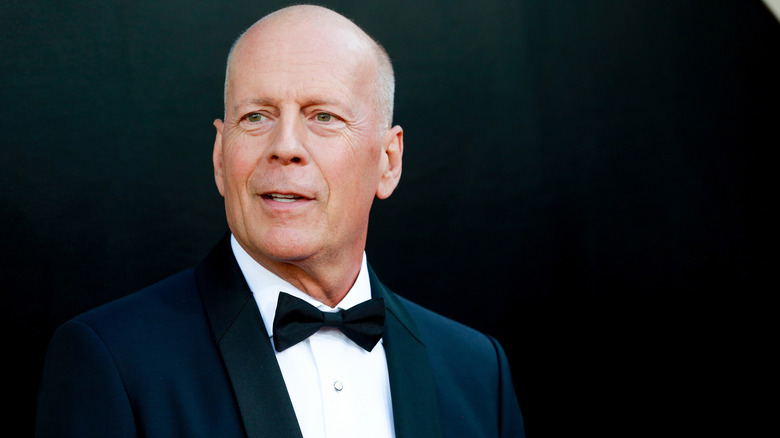 Bruce Willis wearing a tuxedo