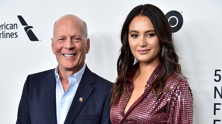 Bruce Willis and wife Emma Heming posing