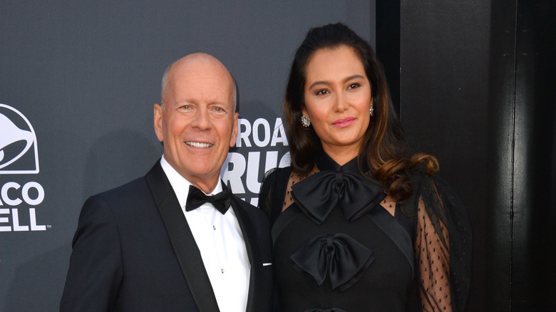 Emma Heming Willis and Bruce Willis pose 