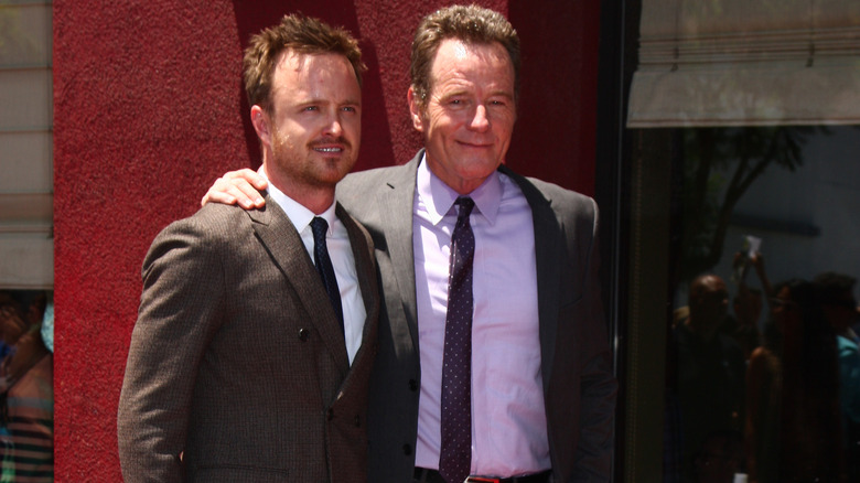 Bryan Cranston receives his Hollywood Walk of Fame star with Aaron Paul