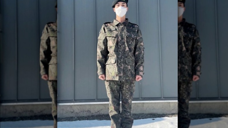 BTS Jin military uniform standing guard