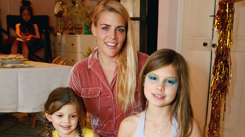 Busy Philipps with her daughters, posing