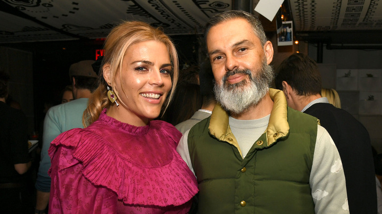 Busy Philipps and Marc Silverstein pose 