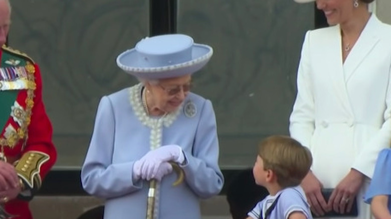 Queen Elizabeth III and Prince Louis speaking