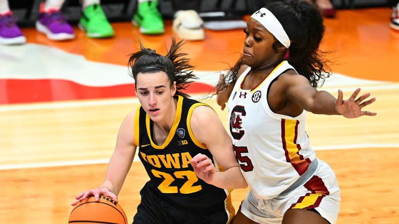 Caitlin Clark and Raven Johnson on the basketball court