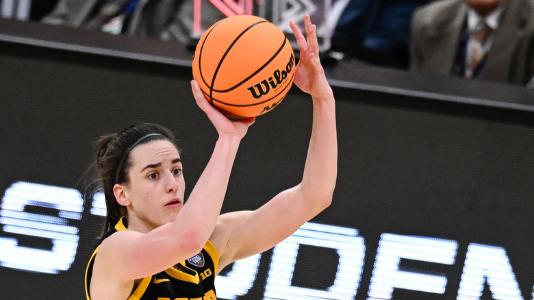 Caitlin Clark shooting a basketball