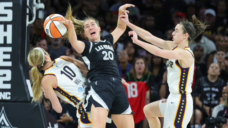 Kate Martin and Caitlin Clark playing basketball