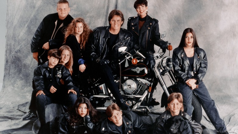 The Jenner and Kardashian family pose for a photo