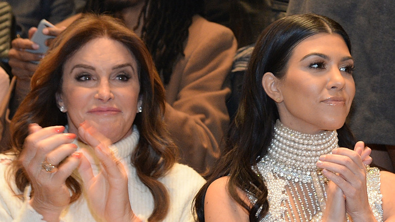 Caitlyn Jenner and Kourtney Kardashian clapping