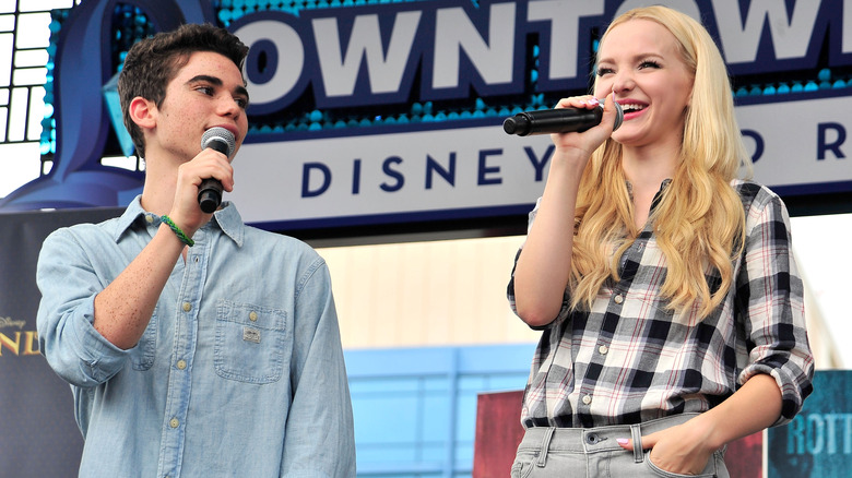 Cameron Boyce and Dove Cameron speaking on stage