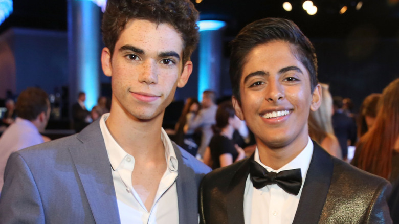 Cameron Boyce and Karan Brar smiling together