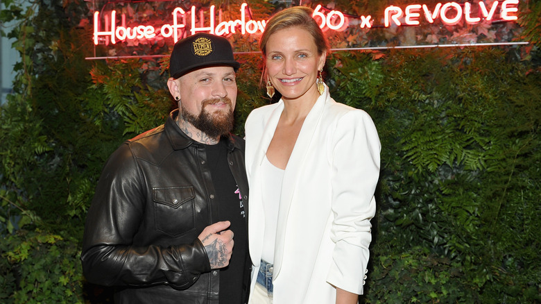 Benji Madden and Cameron Diaz attending fashion event