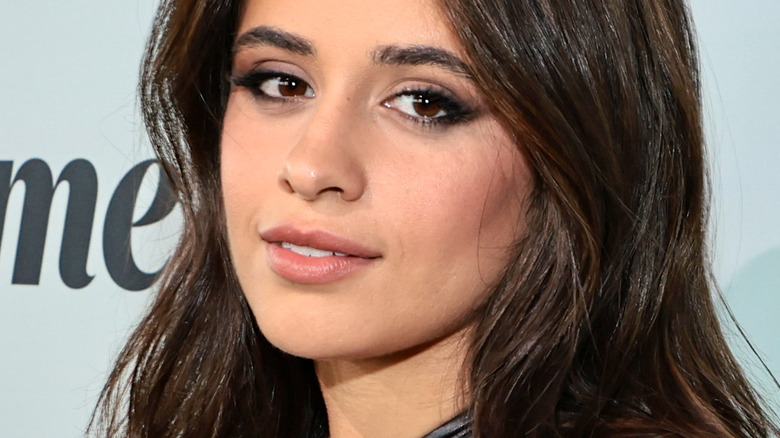 Camila Cabello smiling yellow eyeliner