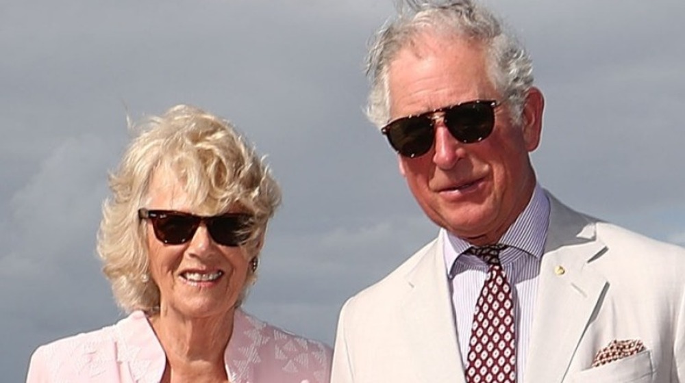 Prince Charles, Prince of Wales and Camilla, Duchess of Cornwall walk on Broadbeach on April 5, 2018