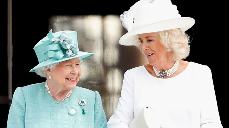 Queen Elizabeth and Camilla posing