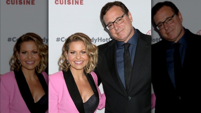 Candace Cameron Bure and Bob Saget embrace in 2019