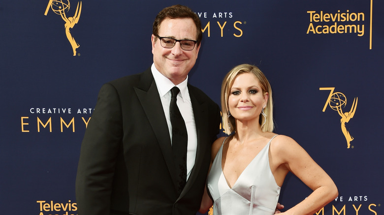 Bob Saget and Candace Cameron Bure pose 