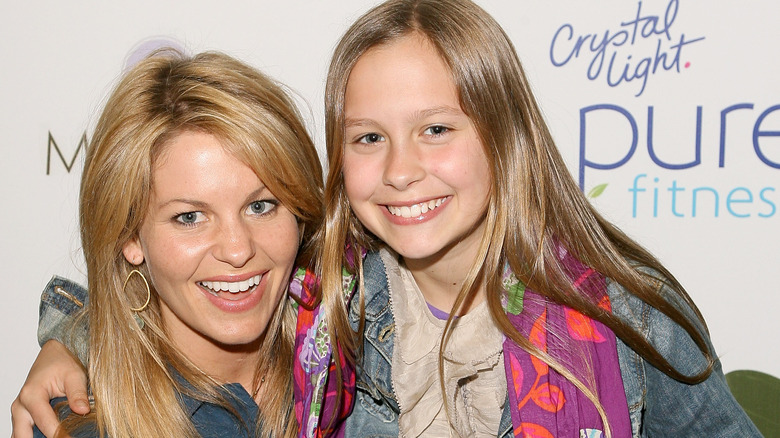 Candace Cameron Bure and young Natasha Bure smiling together 