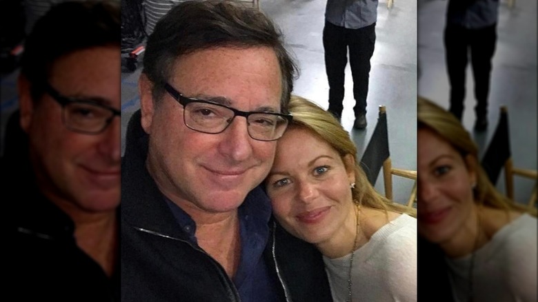 Candace Cameron Bure with head on Bob Saget's shoulder