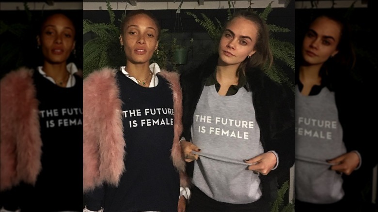 Cara Delevingne wearing a Future is Female shirt