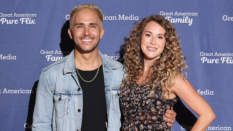 Carlos and Alexa PenaVega smiling