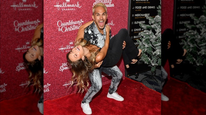 Carlos holds Alexa PenaVega