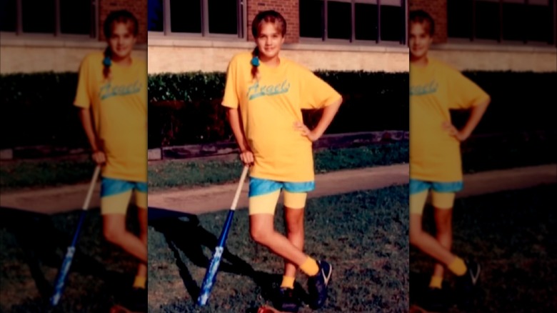 Carrie Underwood poses with softball bat