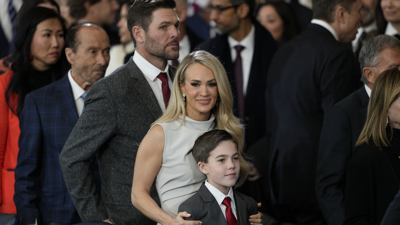 Mike Fisher, Carrie Underwood and their son, Isaiah at the inauguration