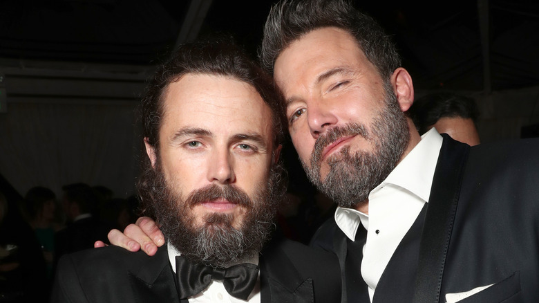 Casey and Ben Affleck embracing