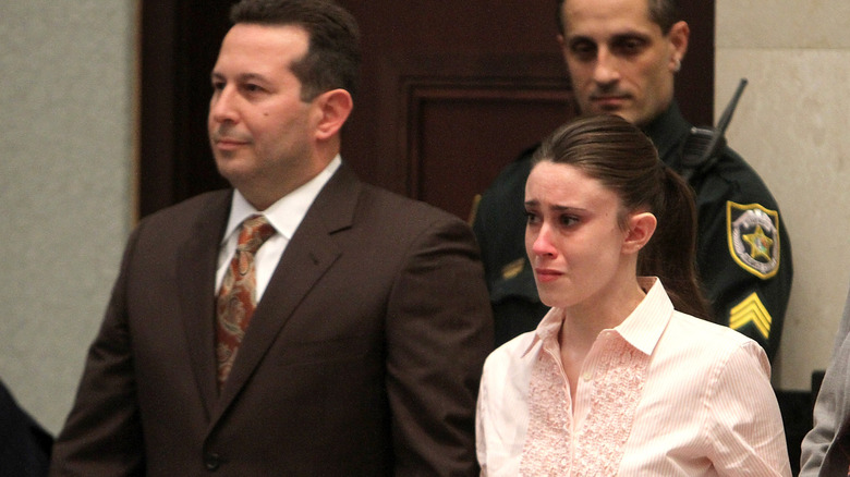 Casey Anthony standing next to her lawyer