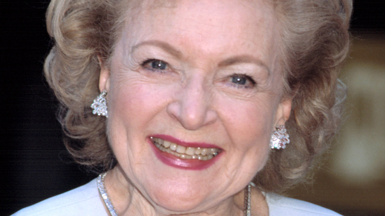 Betty White smiles at an event