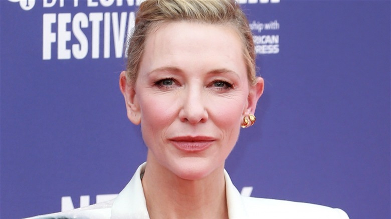 Cate Blanchett hair pinned back earrings in one ear