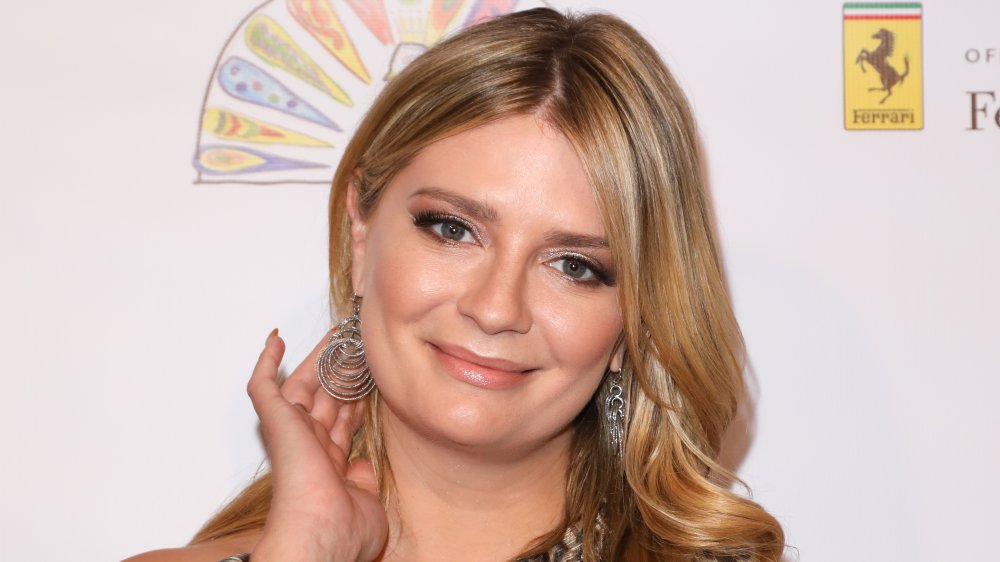 Mischa Barton with long silver earrings