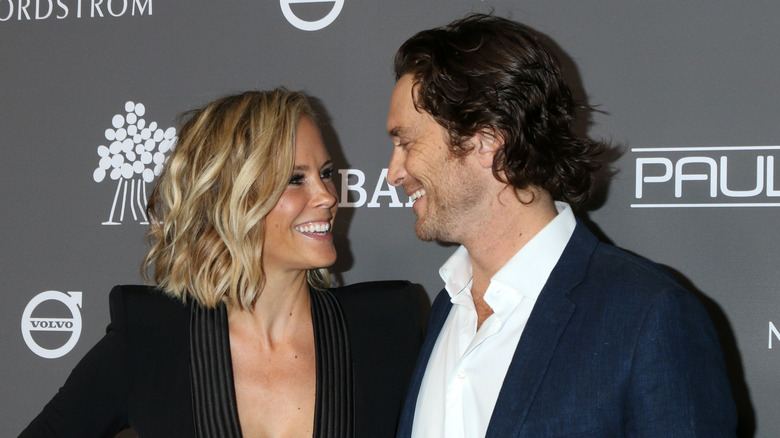 Oliver Hudson and Erinn Bartlett pose at the Baby2Baby Gala