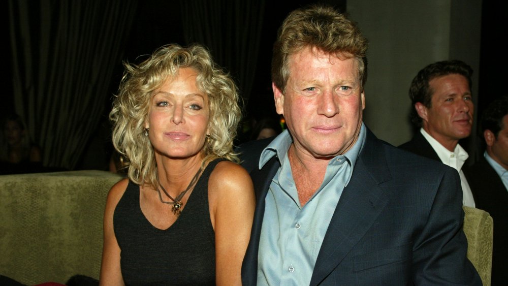 Farrah Fawcett & Ryan O'Neal sitting down