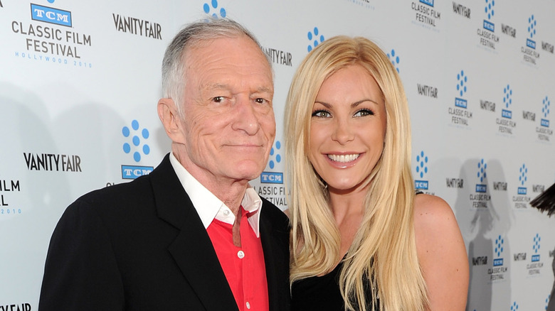 Hugh Hefner and Crystal Harris posing