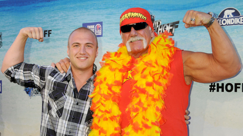 Nick and Hulk Hogan flexing